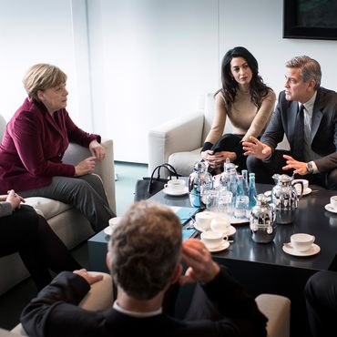 George und Amal Clooney, Angela Merkel