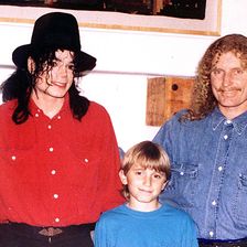 Brett Livingston Strong, Right, Poses With His Son Stason, Pop Star Michael Jackson, And Lisa Marie Presley