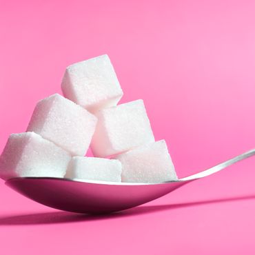 8 Anzeichen, dass wir zu viel Zucker essen