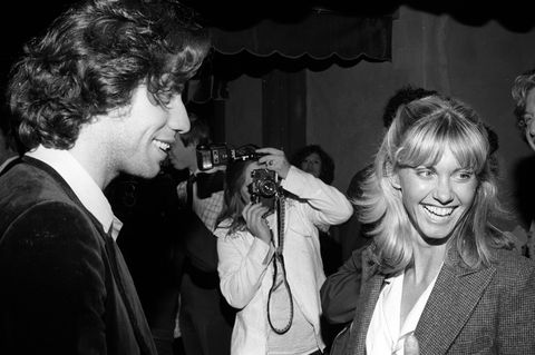 Mit Filmpartner John Travolta in den 80er Jahren auf einer Party