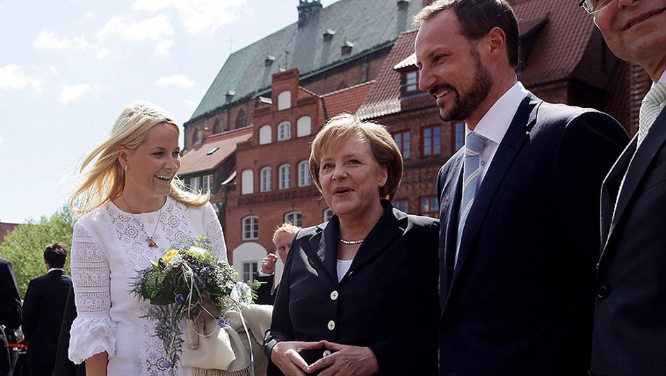 Princess Mette-Marit of Norway (L), Prince Haakon of Norway and German Chancellor Angela Merkel